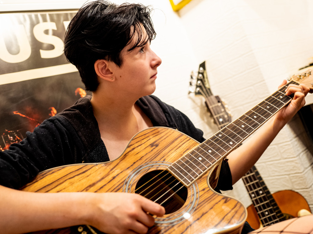 Acoustic Guitar Player.