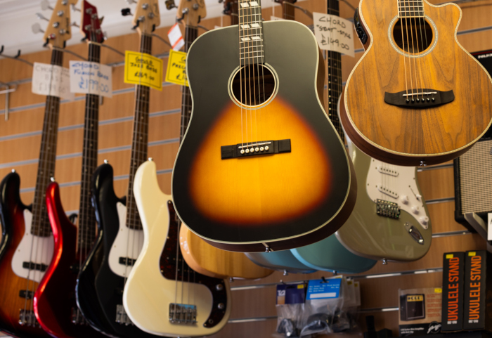 Acoustic Guitars 2026 on the Wall